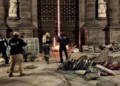 Dos sujetos prenden fuego a portón de la catedral de Puebla